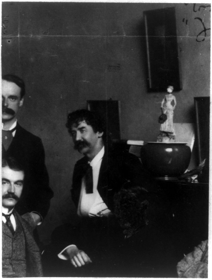 Detail showing James McNeill Whistler from a portrait group in Whistler's London studio, 1881. The face of Julian Story has been blacked out LCCN2002708769