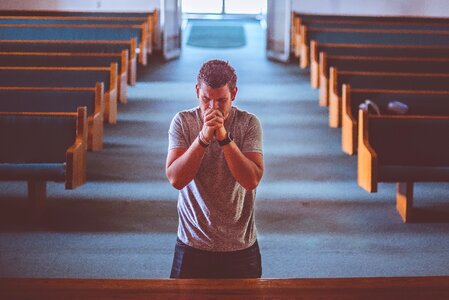 Praying kneel down photo