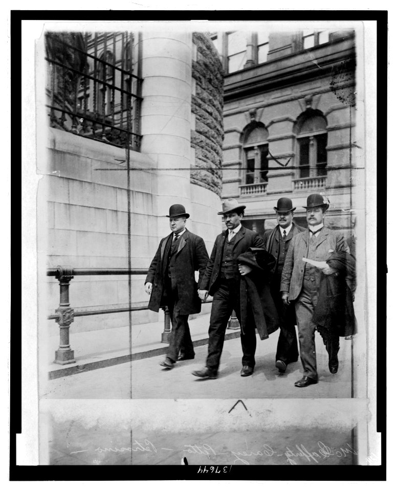 Detective Lt. Joseph Petrosiino( left) , Inspector Carey and Inspector McCafferty escorting Mafia hitman Petto the Ox (Tomasso Petto, second from left) LCCN2007686607