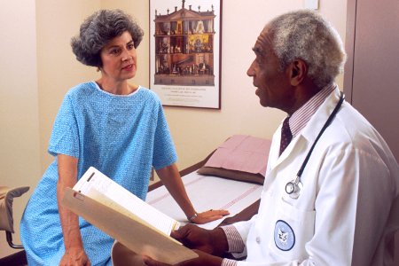 Doctor consults with patient (7) photo