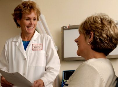 Doctor talking with a patient photo