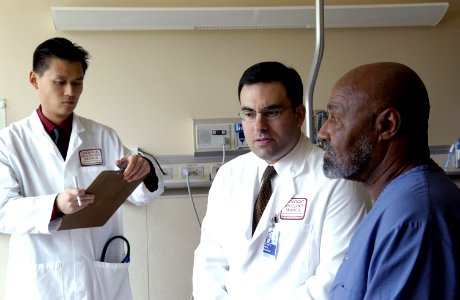 Doctor consults with patient (1) photo
