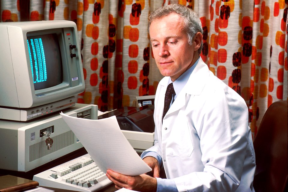 Doctor reviewing pdq