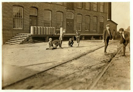 Doffer boys have lots of fun between times. (But get habits of irregular work.) This is the middle of the morning. Willingham Cotton Mills, Macon, Ga. LOC nclc.01614
