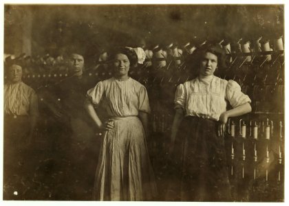 Doffer girls in Brookside Worsted Mills. Westford, Mass. These were the youngest. Young children are said to be working there, but they were not there that day. LOC nclc.01691 photo