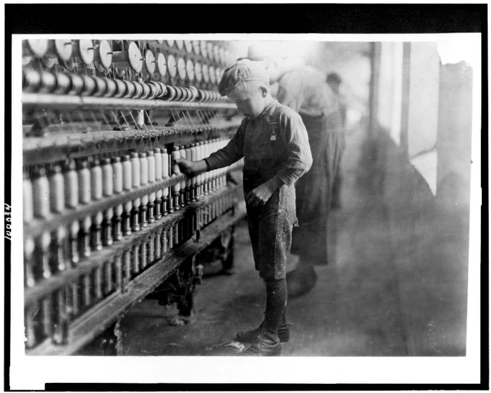 Doffer in Mellville Mfg. Co., Cherryville, N.C. Said he had been working for two years. Many of them below age. LOC cph.3c00034