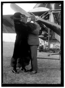 DOMENJOS, JUAN, OF SOUTH AMERICA, AVIATOR. WITH WIFE LCCN2016866883