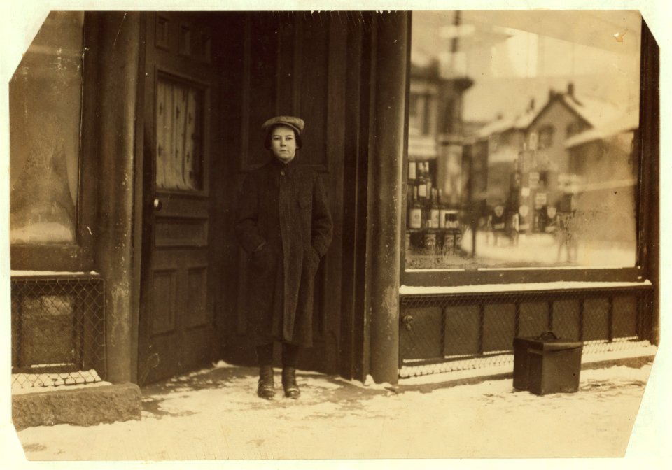 Dona Marchland, 1187 Pleasant St., at door of home which is on top floor. Has been doffer in Spinning Room of Cartwright Mills 5 mos. LOC nclc.02529