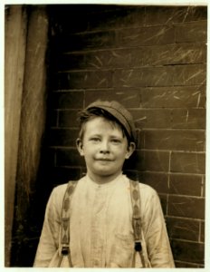 Donald Mallick, ('Happy'), 203 King Street. 9 years of age, selling newspapers 5 years. Average earnings 35 cents a week. Sells from choice. Father, rivet driver, $20 weekly. 'Happy' is well LOC nclc.03578
