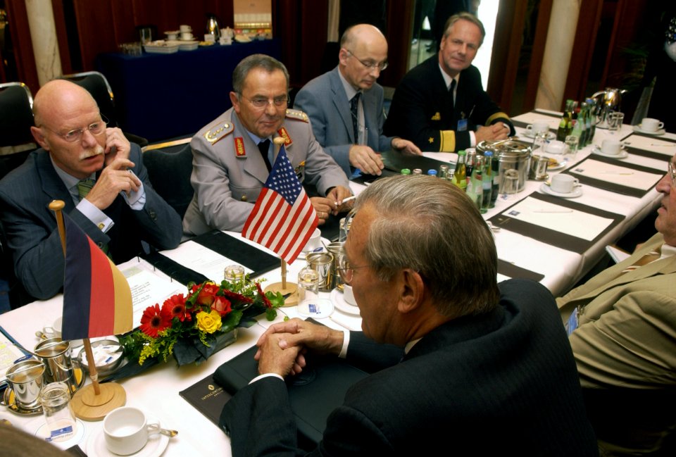 Donald Rumsfeld talks with Peter Struck