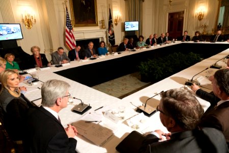 Donald Trump participates in an Infrastructure Initiative Meeting in the State Dining Room of the White House on February 12, 2018