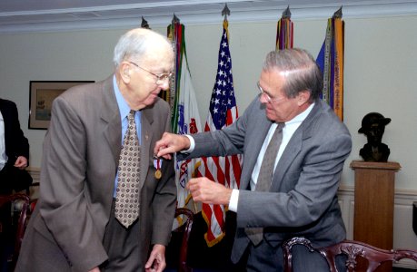 Donald Rumsfeld awards Jesse Helms the Department of Defense Distinguished Public Service Medal