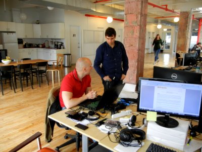 Developers working on the “Talk. They Hear You.” mobile app. (14442808170)