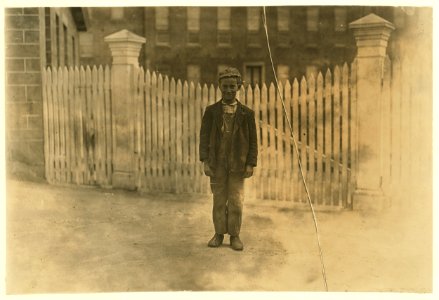 Donimeco Cipella works in he card room of the Natick Mills, Natick, R. I. Has been there 2 years. 'Once dey made me stop and said I should go to school but I'm workin' again.' Does he look LOC cph.3b46696