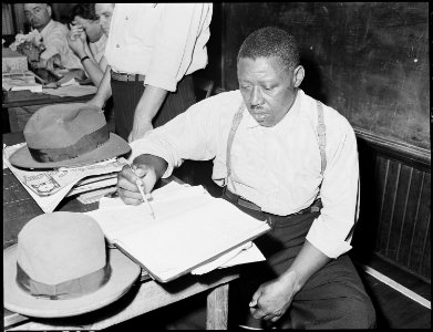 Doorkeeper at meeting of local UMWA union. Inland Steel Company, Wheelwright ^1 & 2 Mines, Wheelwright, Floyd County... - NARA - 541442