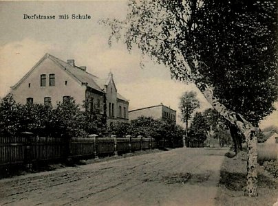 Dorfstrasse mit Schule photo
