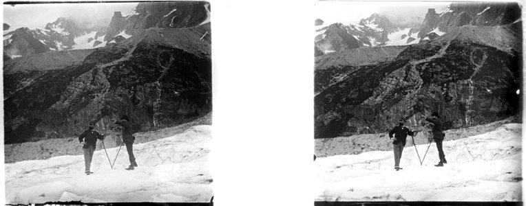 Dos homes en una glacera i muntanyes nevades al fons (AFCEC MORELLO X 054)