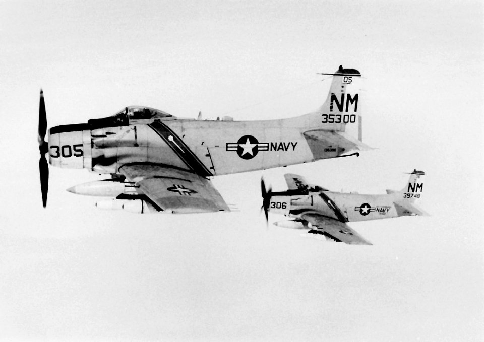 Douglas A-1H Skyraiders of VA-52 in flight off Vietnam in 1966