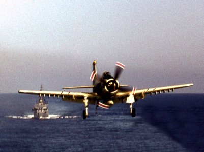 Douglas A-1H Skyraider of VA-165 pproaching USS Intrepid (CVS-11), in 1966
