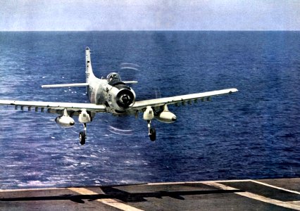 Douglas A-1H Skyraider of VA-52 landing aboard USS Ticonderoga (CVA-14), in 1964