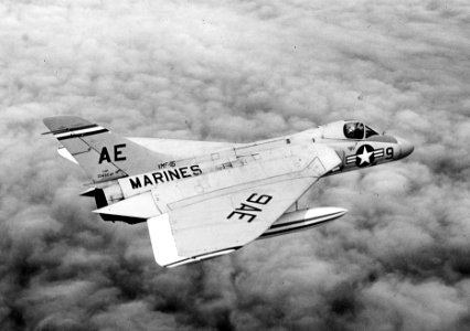 Douglas F4D-1 Skyray of VMF-115 in flight, 17 March 1957 (NNAM.1996.253.7328.022)