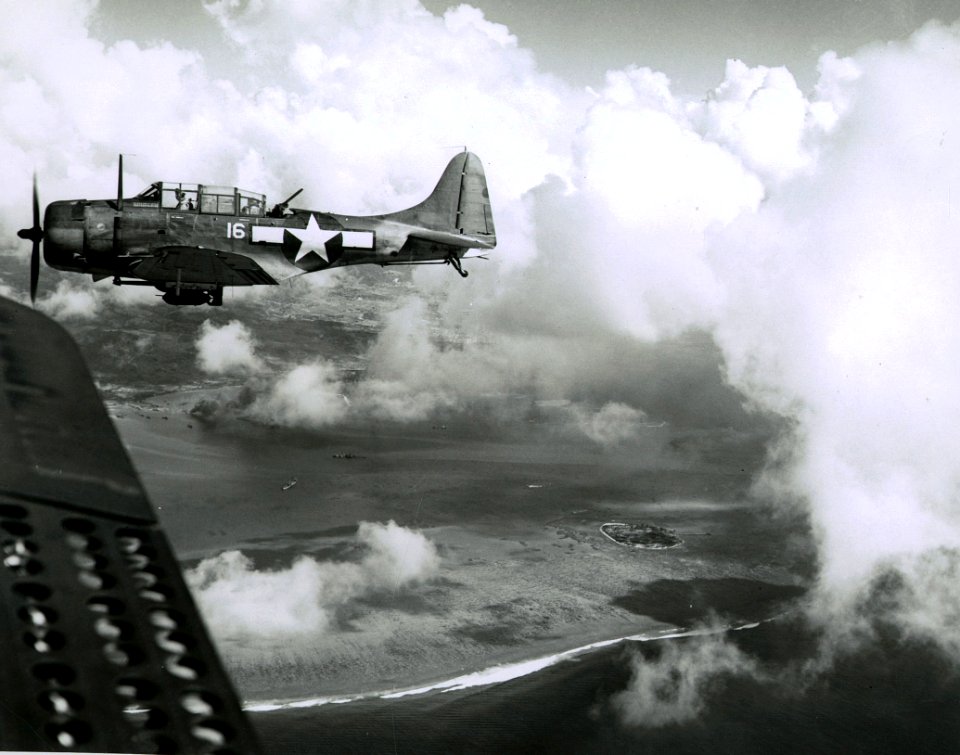 Douglas SBD-5 Dauntless of VB-16 in flight over Saipan on 15 June 1944 (NNAM.1996.253.678)