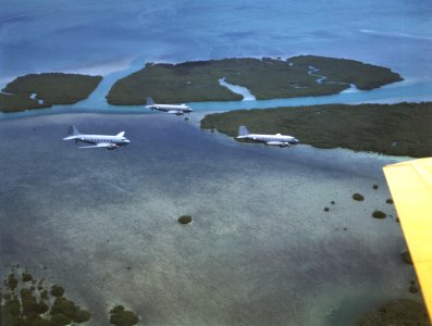Douglas R4D aircraft from VR-7 in flight over the Florida Keys, circa in 1943 (80-G-K-15710)