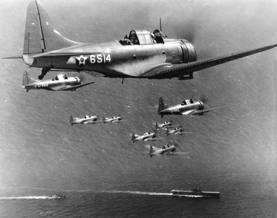 Douglas SBD-2 Dauntless of VS-6 in flight over USS Enterprise (CV-6) on 27 October 1941 (80-G-6678)