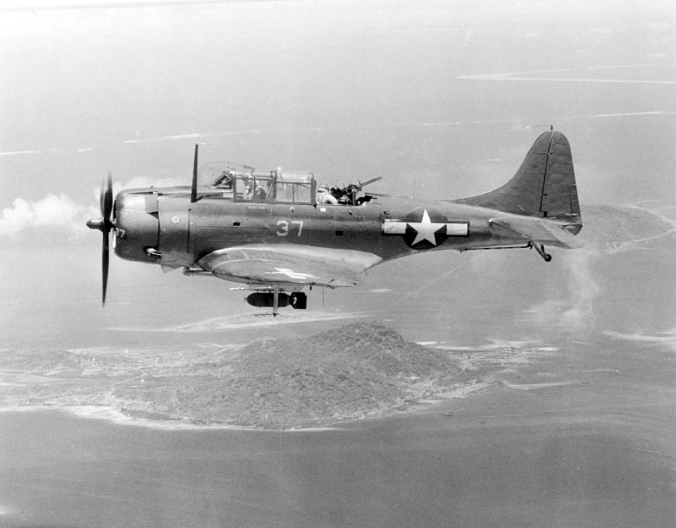 Douglas SBD-5 of VB-16 in flight over Truk, in February 1944 (NNAM.1996.253.687)