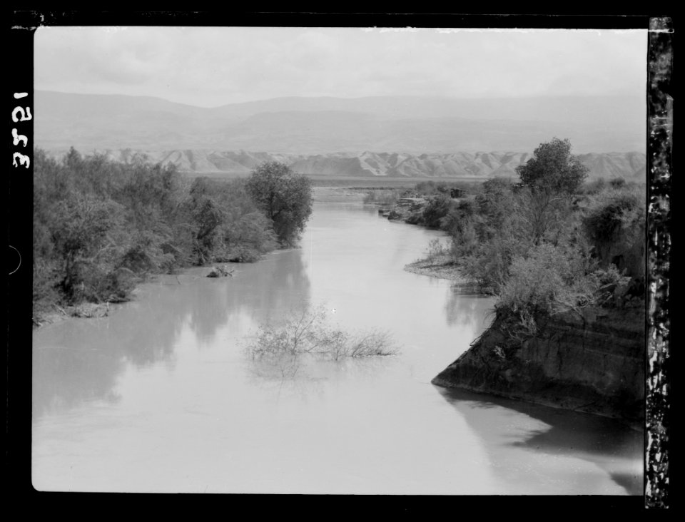 Down the Jordan Valley from the Sea of Galilee to the Dead Sea. Jordan River below Sheik Hussein showing depression through which Jordan flows LOC matpc.15249