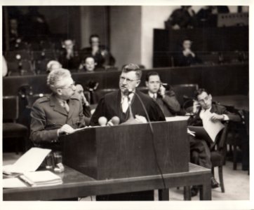 Dr. A. Horlik-Hochwald listens as Dr. Robert Servatius enters an objection to the court