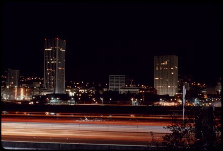 Downtown-core-area-of-portland-after-7-pm-on-november-2-1973-during-the-states-energy-crisis-with-few-commercial-and-neon-lighting-displays-this-photo-looks-toward-the-west-with-the-willamette-river-in-the-foreground-111973 4272465292 o