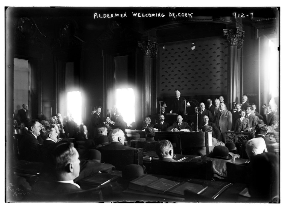 Dr. Cook welcomed by aldermen in reception room, New York LCCN2014684330