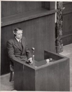 Dr. Herbert Ausgustinick on the witness stand during the Doctors' Trial photo