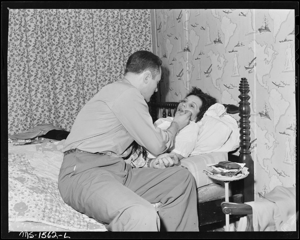 Dr. R.V. Tokar on house call. House calls are included in the medical fee of $1.20 per family. U.S. Coal and Coke... - NARA - 540856