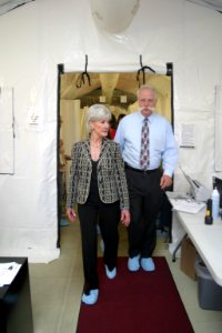 Dr. Robert Dodson of St. John's Hospital in Joplin leads Secretary Sebelius on a tour of the Mobile Medical Unit (or MASH unit)