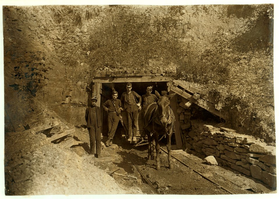 Drift Mouth, San Lick Mine, near Grafton, W. Va. Bank Boss in centre- driver on his right- trapper boy outside. Alfred, about 14. He trapped several years during vacation- said he is going LOC nclc.01063