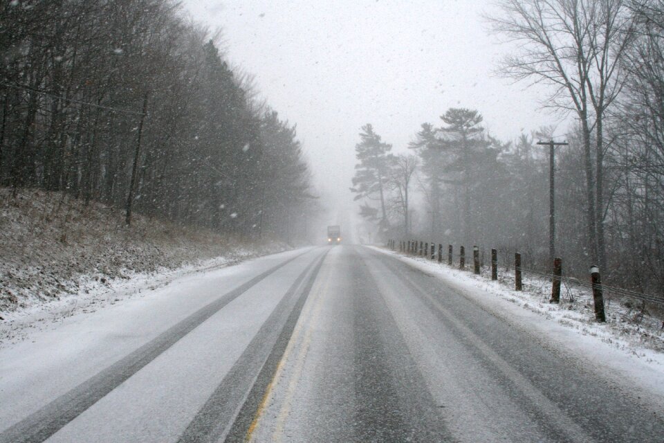 Snow storm car trip photo