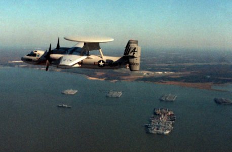 E-2C VAW-78 in flight over James River reserve fleet 1983