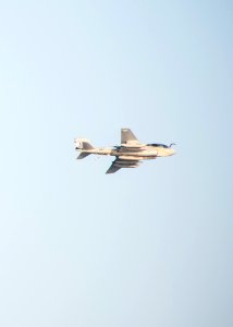 E-A-6B Prowler flies over USS Truxtun 140929-N-EI510-066