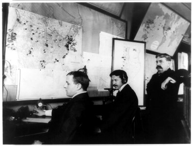 E.C. Heasley, Jules A. Rodier and Maj. Montgomery in the telegraph room in the White House, set up to receive news of the Spanish-American War LCCN96515455