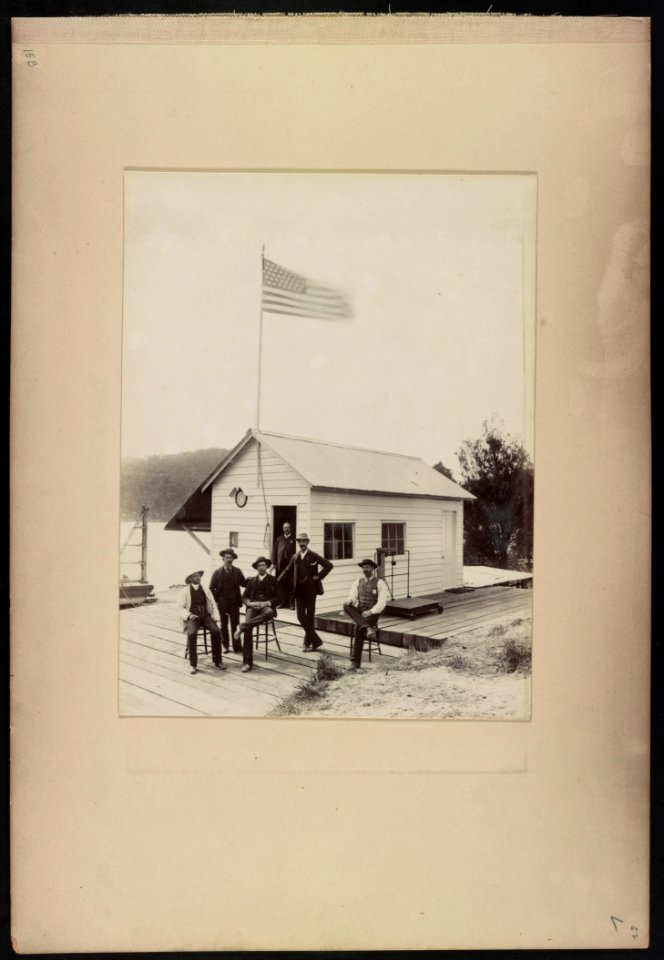 E.K. Morse, S.V. Ryland, and others outside the office of Ryland & Morse for the Hawkesbury River Railway Bridge project, Bangar Island, New South Wales, Australia LCCN2016651643