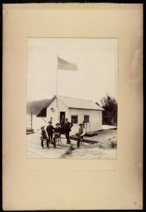 E.K. Morse, S.V. Ryland, and others outside the office of Ryland & Morse for the Hawkesbury River Railway Bridge project, Bangar Island, New South Wales, Australia LCCN2016651643