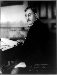 E.J. Babcock, Private Secretary to Secretary of State, half-length portrait, seated at desk, facing left LCCN89715778