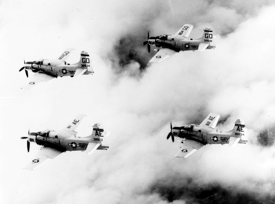 EA-1F Skyraiders of VAW-33 in flight in the mid-1960s