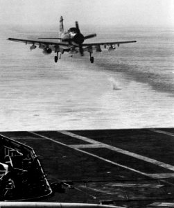 EA-1F of VAQ-33 approaches USS Independence (CVA-62) c1968