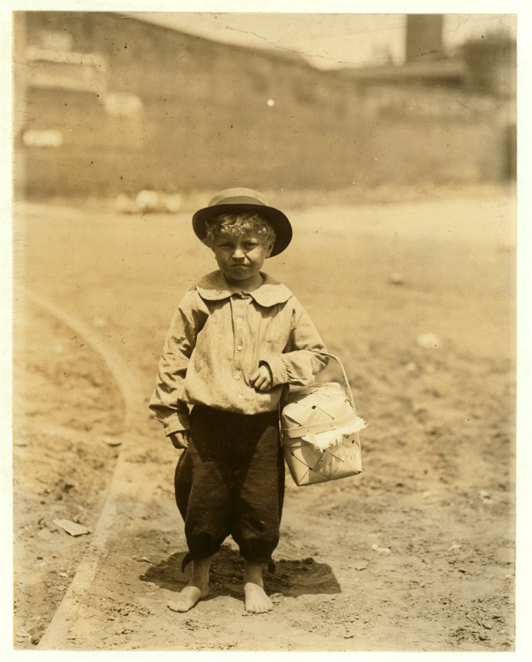 Eagle and Phoenix Mill. 'Dinner-toters' waiting for the gate to open. This is carried on more in Columbus than in any other city I know, and by smaller children. (See photos.) Many of them LOC nclc.05343