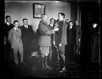 George E. Adamson, 1st. Lt. Quartermaster Corps, receiving Distinguished Service Cross from Gen. Pershing for his work as Confidential Secy. to Commander-in-Chief of the Amer. Expeditionary LCCN2016891927