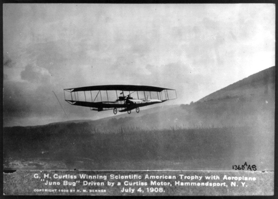 G.H. Curtiss winning Scientific American Trophy with aeroplane June Bug, driven by a Curtiss Motor, Hammondsport, N.Y., July 4, 1908 LCCN2001705775