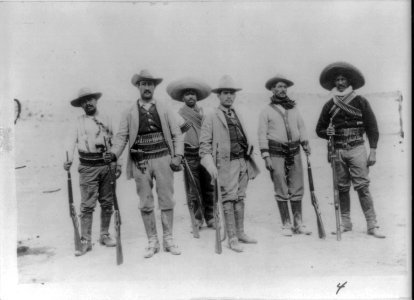Gen. Campa, full, standing, with Insurrecto staff LCCN2007677275